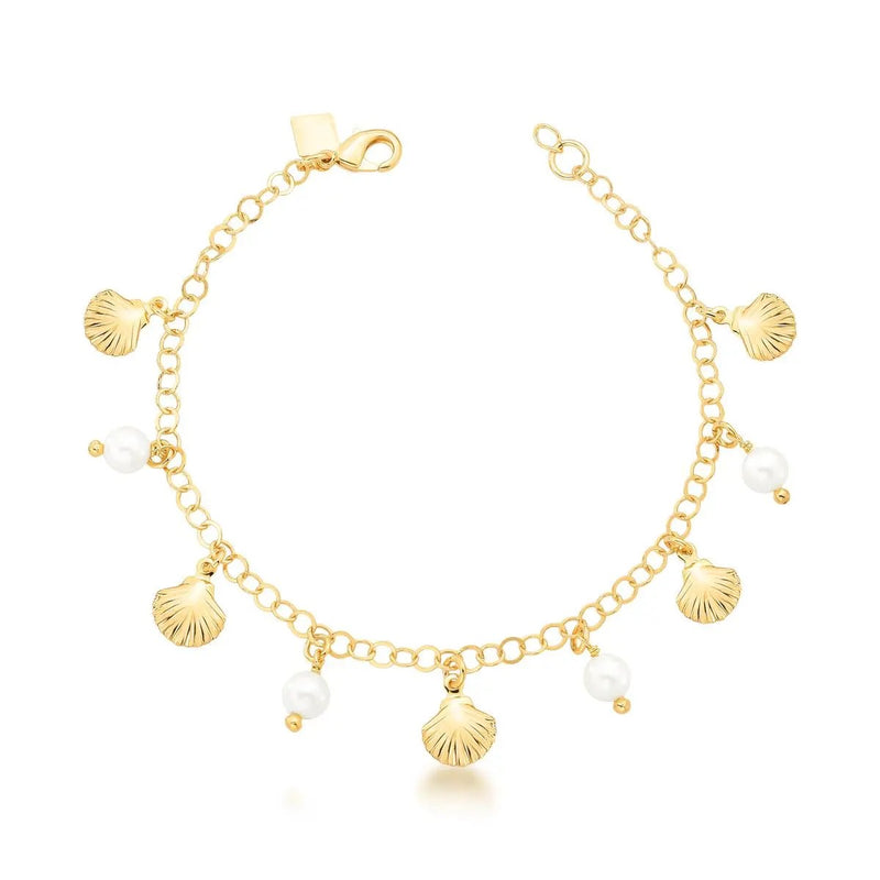 Gold bracelet with shell and pearl charms on a white background