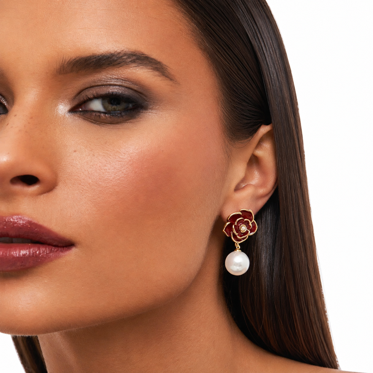 Woman wearing a beautiful earring with a pearl