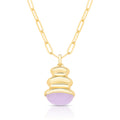 Gold necklace with a purple pendant on a white background