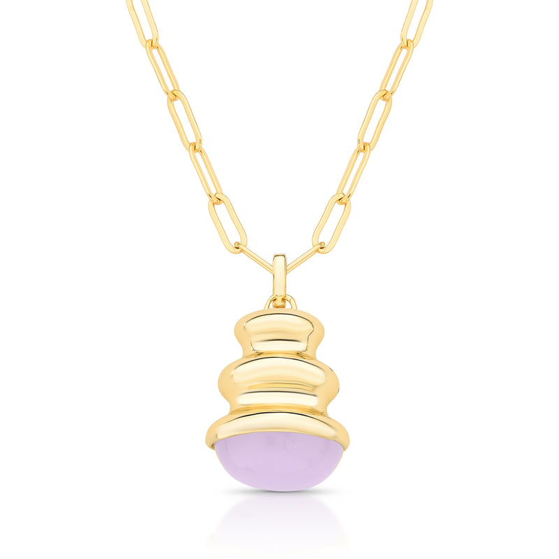 Gold necklace with a purple pendant on a white background