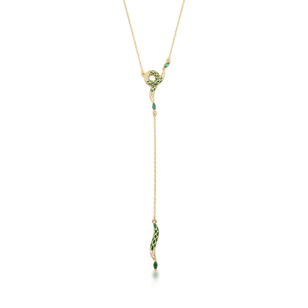 Gold necklace with green pendant on a white background
