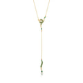 Gold necklace with green pendant on a white background