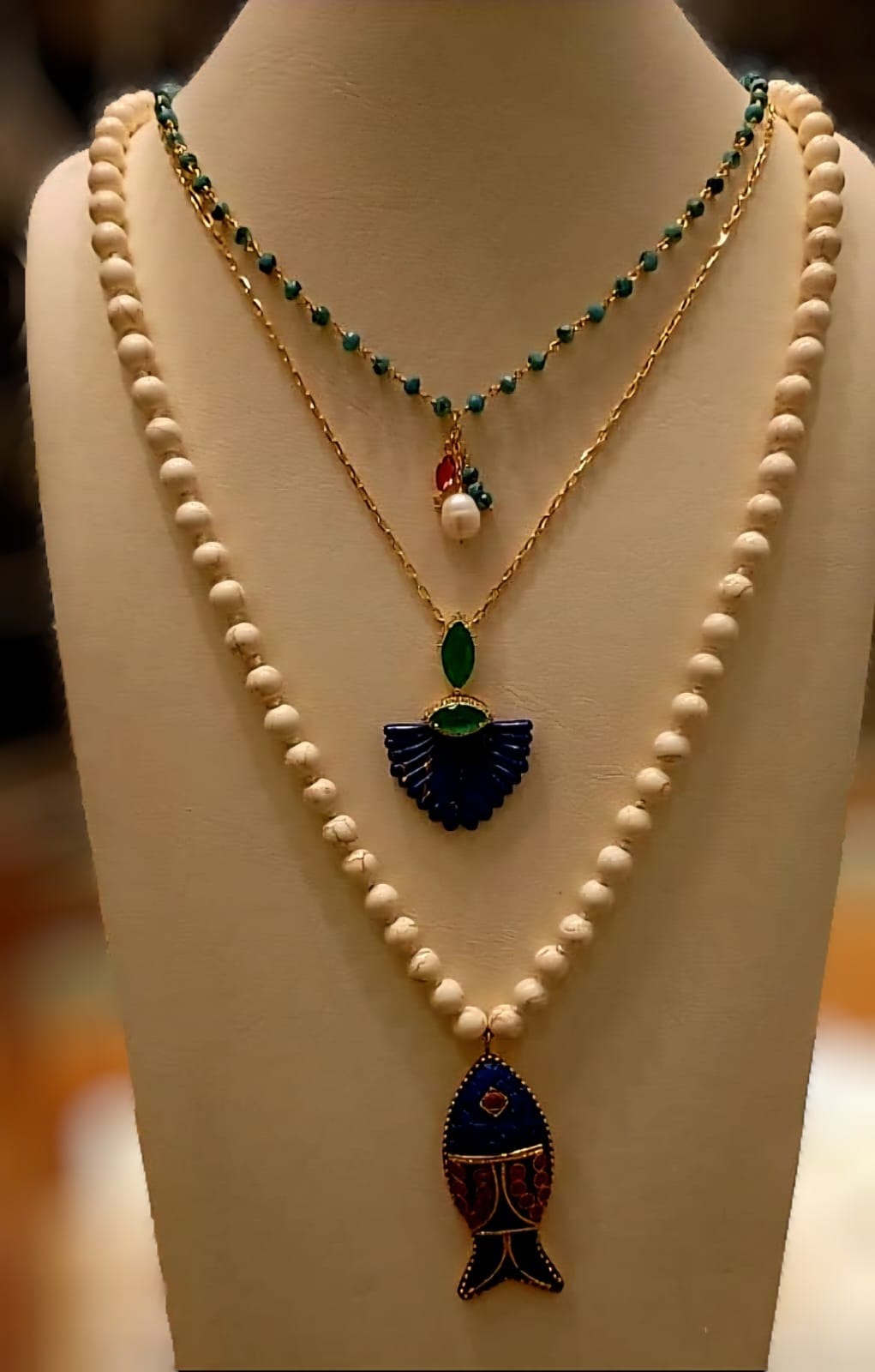Necklace with a fish pendant