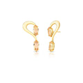 Gold earrings with peach-colored gemstones on a white background