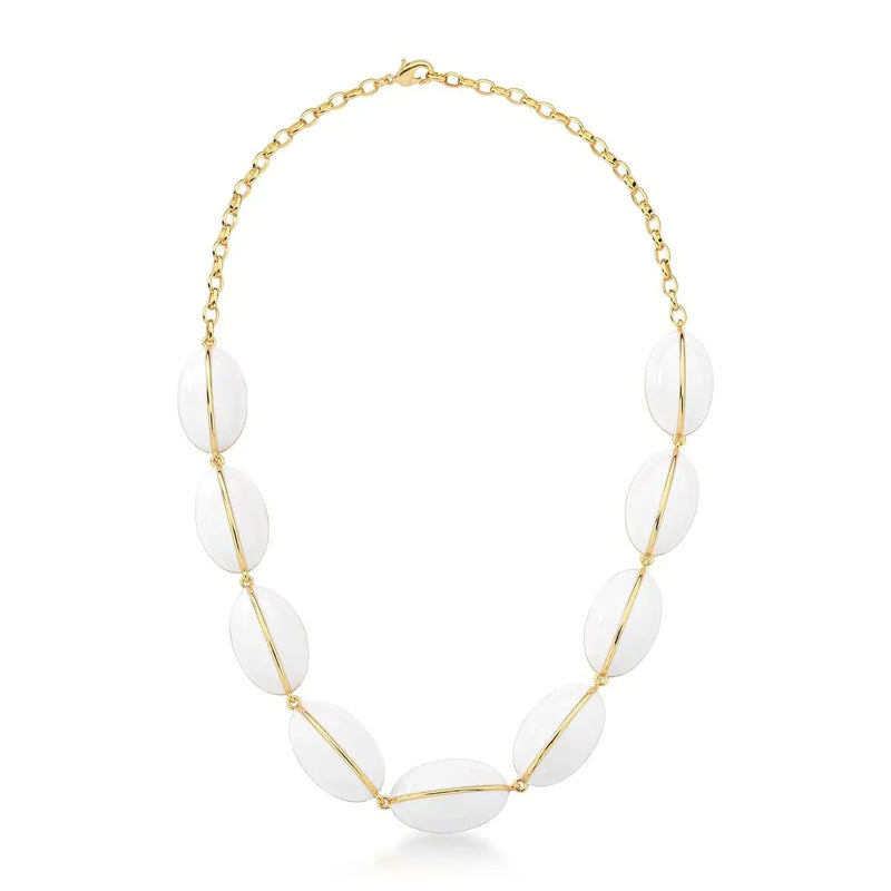 Necklace with white beads and gold chain on a white background