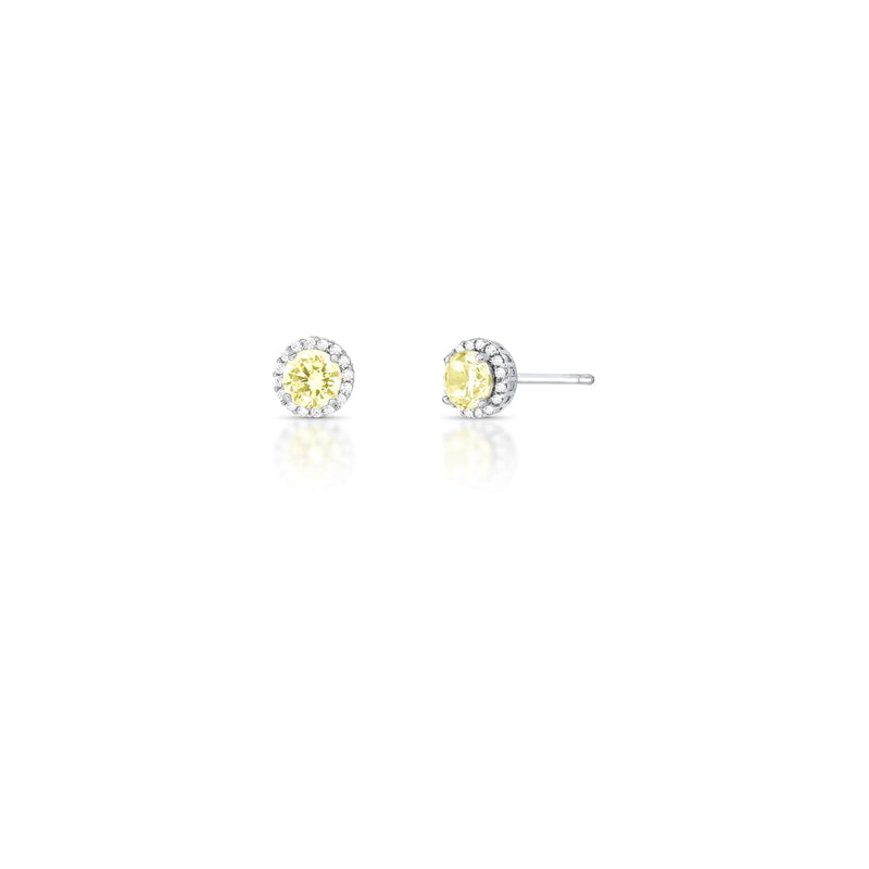 Rhodium-plated stud earrings featuring round yellow crystals surrounded by sparkling zirconia