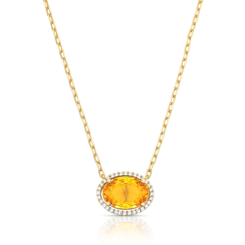 18K gold-plated necklace featuring an oval amber crystal surrounded by a sparkling zirconia halo