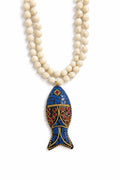 Necklace with a blue fish-shaped pendant on a white background